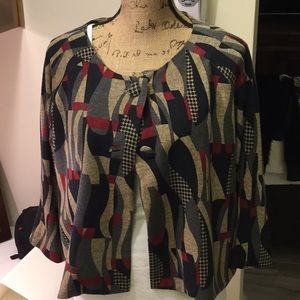 Geometric sweater. Short swing style